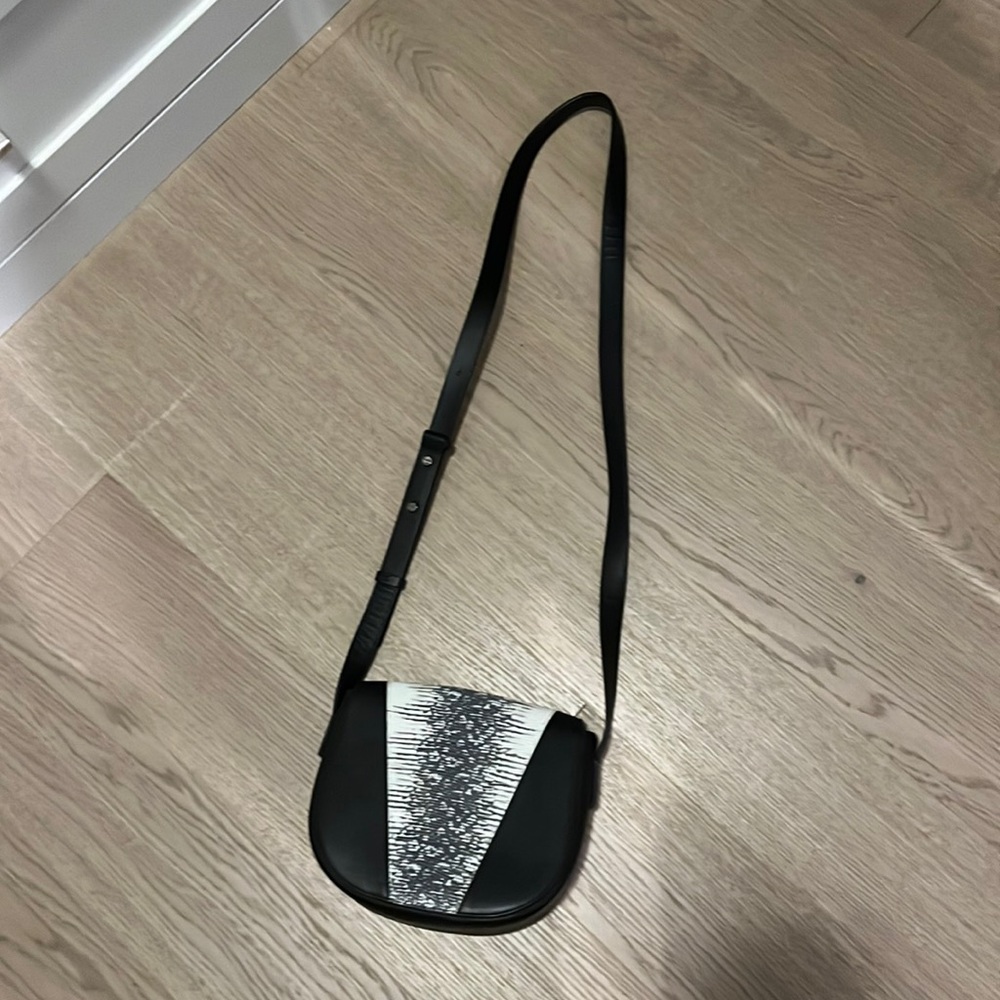 Vince womens cross body bag with snake skin detail.